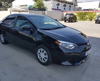 Frontansicht eines Mietwagens Toyota Corolla Sedan in Tiflis, Georgien ✓ Auto Nr.230. ✓ Automatisch TM ✓ 0 Bewertungen.