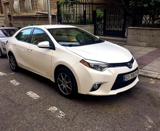 Frontansicht eines Mietwagens Toyota Corolla Sedan in Tiflis, Georgien ✓ Auto Nr.659. ✓ Automatisch TM ✓ 0 Bewertungen.