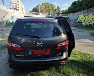Vermietung Mazda Premacy. Komfort, Minivan Fahrzeug zur Miete auf Zypern ✓ Kaution Einzahlung von 300 EUR ✓ Versicherungsoptionen KFZ-HV, TKV, VKV Plus, Junge.