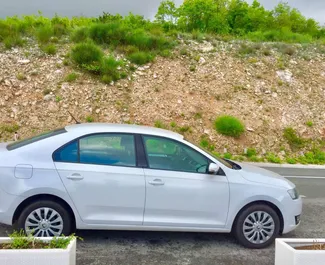 Autovermietung Skoda Rapid Nr.2025 Automatisch in Budva, ausgestattet mit einem 1,0L Motor ➤ Von Vuk in Montenegro.