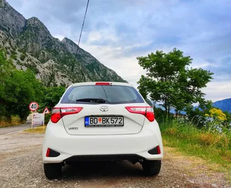 Vermietung Toyota Yaris. Wirtschaft, Komfort Fahrzeug zur Miete in Montenegro ✓ Kaution Einzahlung von 100 EUR ✓ Versicherungsoptionen KFZ-HV, TKV, VKV Plus, Insassen, Diebstahlschutz, Ausland.