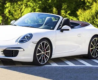 Frontansicht eines Mietwagens Porsche 911 Carrera S Cabrio in Becici, Montenegro ✓ Auto Nr.2480. ✓ Automatisch TM ✓ 0 Bewertungen.