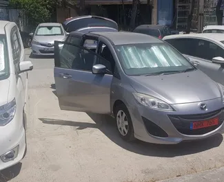 Frontansicht eines Mietwagens Mazda Premacy in Limassol, Zypern ✓ Auto Nr.3890. ✓ Automatisch TM ✓ 0 Bewertungen.