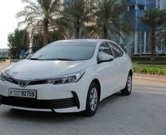 Frontansicht eines Mietwagens Toyota Corolla Sedan in Dubai, VAE ✓ Auto Nr.4861. ✓ Automatisch TM ✓ 0 Bewertungen.