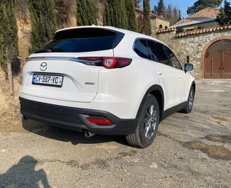 Vermietung Mazda CX-9. Komfort, Premium, Crossover Fahrzeug zur Miete in Georgien ✓ Kaution Keine Kaution ✓ Versicherungsoptionen KFZ-HV, TKV, VKV Plus, Insassen, Diebstahlschutz.