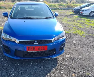 Frontansicht eines Mietwagens Mitsubishi Lancer in Limassol, Zypern ✓ Auto Nr.6003. ✓ Automatisch TM ✓ 0 Bewertungen.