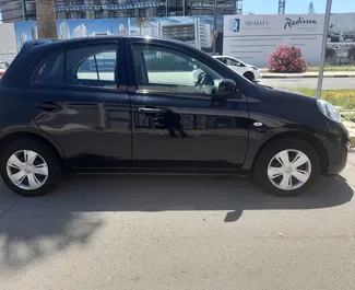 Frontansicht eines Mietwagens Nissan March in Larnaca, Zypern ✓ Auto Nr.6510. ✓ Automatisch TM ✓ 0 Bewertungen.