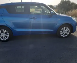 Frontansicht eines Mietwagens Suzuki Swift in Larnaca, Zypern ✓ Auto Nr.6511. ✓ Automatisch TM ✓ 0 Bewertungen.