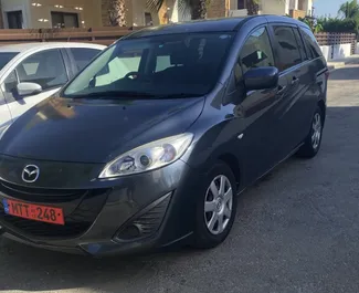 Frontansicht eines Mietwagens Mazda Premacy in Limassol, Zypern ✓ Auto Nr.2076. ✓ Automatisch TM ✓ 4 Bewertungen.