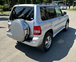 Mietwagen Mitsubishi Pajero Io 2006 in Georgien, mit Benzin-Kraftstoff und 130 PS ➤ Ab 100 GEL pro Tag.