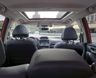 Innenraum von Subaru Forester Limited zur Miete in Georgien. Ein großartiges 5-Sitzer Fahrzeug mit Automatisch Getriebe.