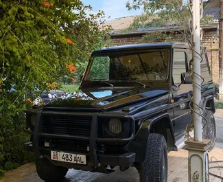 Frontansicht eines Mietwagens Mercedes-Benz G-Class in Osch, Kirgisistan ✓ Auto Nr.7076. ✓ Schaltgetriebe TM ✓ 0 Bewertungen.