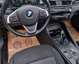 Autovermietung BMW X1 Nr.7115 Automatisch in Rafailovici, ausgestattet mit einem 2,0L Motor ➤ Von Nikola in Montenegro.