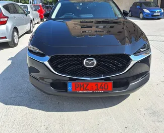 Frontansicht eines Mietwagens Mazda CX-30 in Limassol, Zypern ✓ Auto Nr.7233. ✓ Automatisch TM ✓ 0 Bewertungen.