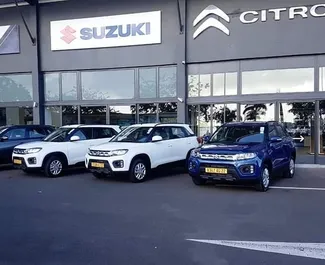 Frontansicht eines Mietwagens Suzuki Vitara Brezza auf Mauritius Flughafen, Mauritius ✓ Auto Nr.7382. ✓ Automatisch TM ✓ 0 Bewertungen.