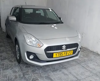 Frontansicht eines Mietwagens Suzuki Swift auf Mauritius, Mauritius ✓ Auto Nr.7423. ✓ Automatisch TM ✓ 0 Bewertungen.