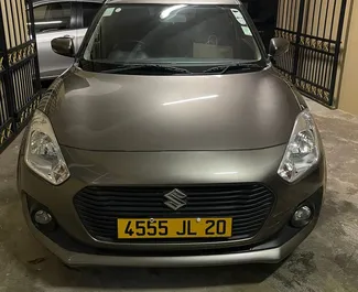 Frontansicht eines Mietwagens Suzuki Swift auf Mauritius, Mauritius ✓ Auto Nr.7461. ✓ Automatisch TM ✓ 0 Bewertungen.