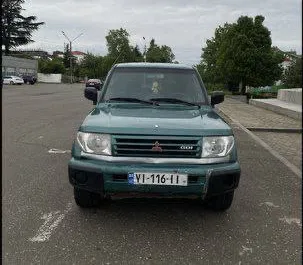 Frontansicht eines Mietwagens Mitsubishi Pajero Io in Kutaisi, Georgien ✓ Auto Nr.7748. ✓ Automatisch TM ✓ 1 Bewertungen.