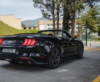 Vermietung Ford Mustang Cabrio. Premium, Luxus, Cabrio Fahrzeug zur Miete in Georgien ✓ Kaution Keine Kaution ✓ Versicherungsoptionen KFZ-HV, VKV Komplett, Diebstahlschutz, Junge.