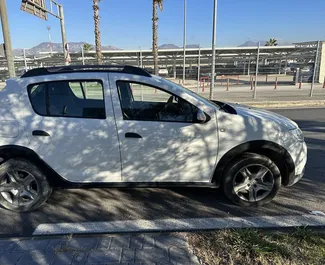 Autovermietung Dacia Sandero Stepway Nr.8375 Schaltgetriebe in Tirana, ausgestattet mit einem 1,5L Motor ➤ Von Erand in Albanien.