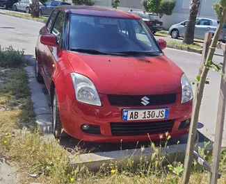 Frontansicht eines Mietwagens Suzuki Swift in Durres, Albanien ✓ Auto Nr.8608. ✓ Schaltgetriebe TM ✓ 0 Bewertungen.