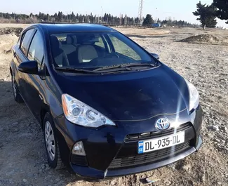 Mietwagen Toyota Prius C 2014 in Georgien, mit Benzin-Kraftstoff und 99 PS ➤ Ab 78 GEL pro Tag.