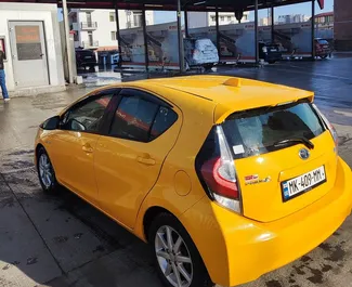 Vermietung Toyota Prius C. Wirtschaft, Komfort Fahrzeug zur Miete in Georgien ✓ Kaution Keine Kaution ✓ Versicherungsoptionen KFZ-HV, VKV Komplett, Insassen, Diebstahlschutz, Keine Kaution.