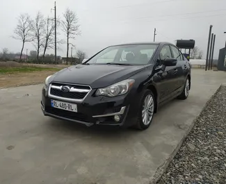 Frontansicht eines Mietwagens Subaru Impreza am Flughafen Kutaisi, Georgien ✓ Auto Nr.9231. ✓ Automatisch TM ✓ 0 Bewertungen.