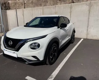 Frontansicht eines Mietwagens Nissan Juke am Flughafen Teneriffa Süd, Spanien ✓ Auto Nr.9511. ✓ Automatisch TM ✓ 0 Bewertungen.