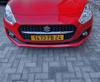 Frontansicht eines Mietwagens Suzuki Swift auf Mauritius, Mauritius ✓ Auto Nr.9353. ✓ Automatisch TM ✓ 0 Bewertungen.