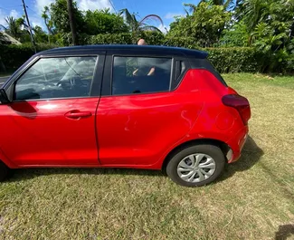 Frontansicht eines Mietwagens Suzuki Swift auf Mauritius, Mauritius ✓ Auto Nr.9420. ✓ Automatisch TM ✓ 0 Bewertungen.