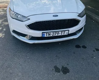 Frontansicht eines Mietwagens Ford Fusion Sedan in Tiflis, Georgien ✓ Auto Nr.9726. ✓ Automatisch TM ✓ 0 Bewertungen.