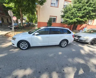 Frontansicht eines Mietwagens Skoda Octavia Combi in Podgorica, Montenegro ✓ Auto Nr.9027. ✓ Automatisch TM ✓ 0 Bewertungen.