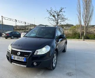 Frontansicht eines Mietwagens Fiat Sedici in Tirana, Albanien ✓ Auto Nr.9999. ✓ Schaltgetriebe TM ✓ 0 Bewertungen.