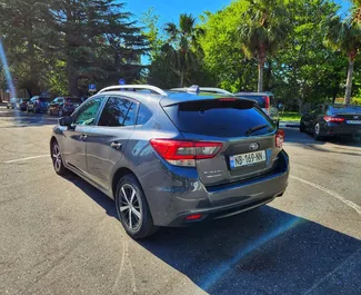 Innenraum von Subaru Impreza zur Miete in Georgien. Ein großartiges 5-Sitzer Fahrzeug mit Automatisch Getriebe.