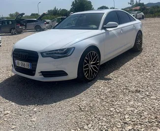 Frontansicht eines Mietwagens Audi A6 am Flughafen von Tirana, Albanien ✓ Auto Nr.10515. ✓ Automatisch TM ✓ 0 Bewertungen.