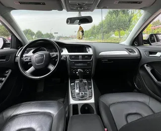 Innenraum von Audi A4 zur Miete in Albanien. Ein großartiges 5-Sitzer Fahrzeug mit Automatisch Getriebe.