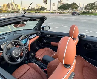 Mini Cooper S Cabrio 2024 zur Miete verfügbar in Dubai, mit Kilometerbegrenzung 250 km/Tag.