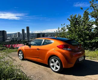 Frontansicht eines Mietwagens Hyundai Veloster in Kutaisi, Georgien ✓ Auto Nr.10800. ✓ Automatisch TM ✓ 0 Bewertungen.