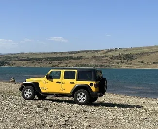 Vermietung Jeep Wrangler. Komfort, SUV Fahrzeug zur Miete in Georgien ✓ Kaution Einzahlung von 800 GEL ✓ Versicherungsoptionen KFZ-HV, TKV, VKV Komplett, Insassen, Diebstahlschutz.