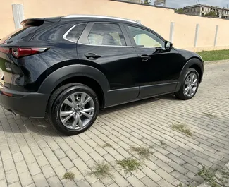 Vermietung Mazda CX-30. Wirtschaft, Komfort, Crossover Fahrzeug zur Miete in Georgien ✓ Kaution Keine Kaution ✓ Versicherungsoptionen KFZ-HV, VKV Komplett, Insassen, Diebstahlschutz.