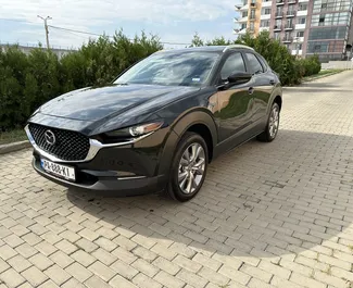 Frontansicht eines Mietwagens Mazda CX-30 in Tiflis, Georgien ✓ Auto Nr.10904. ✓ Automatisch TM ✓ 0 Bewertungen.