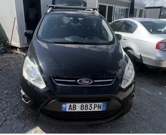 Frontansicht eines Mietwagens Ford C-Max Grand am Flughafen von Tirana, Albanien ✓ Auto Nr.11069. ✓ Schaltgetriebe TM ✓ 0 Bewertungen.