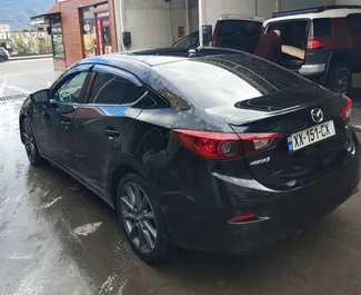 Vermietung Mazda 3. Wirtschaft, Komfort Fahrzeug zur Miete in Georgien ✓ Kaution Keine Kaution ✓ Versicherungsoptionen KFZ-HV, VKV Komplett, Diebstahlschutz, Keine Kaution.