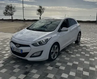 Vermietung Hyundai i30. Wirtschaft, Komfort Fahrzeug zur Miete in Albanien ✓ Kaution Keine Kaution ✓ Versicherungsoptionen KFZ-HV, TKV, VKV Komplett, Diebstahlschutz, Ausland, Junge.