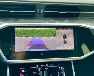 Innenraum von Audi A6 zur Miete in VAE. Ein großartiges 5-Sitzer Fahrzeug mit Automatisch Getriebe.