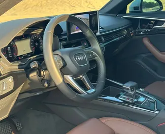 Audi A4 2023 zur Miete verfügbar in Dubai, mit Kilometerbegrenzung 250 km/Tag.