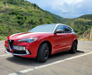 Frontansicht eines Mietwagens Alfa Romeo Stelvio Quadrifoglio in Tiflis, Georgien ✓ Auto Nr.11484. ✓ Automatisch TM ✓ 0 Bewertungen.