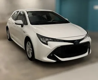 Frontansicht eines Mietwagens Toyota Corolla in Valencia, Spanien ✓ Auto Nr.11037. ✓ Automatisch TM ✓ 0 Bewertungen.