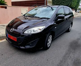 Frontansicht eines Mietwagens Mazda Premacy in Limassol, Zypern ✓ Auto Nr.6681. ✓ Automatisch TM ✓ 0 Bewertungen.